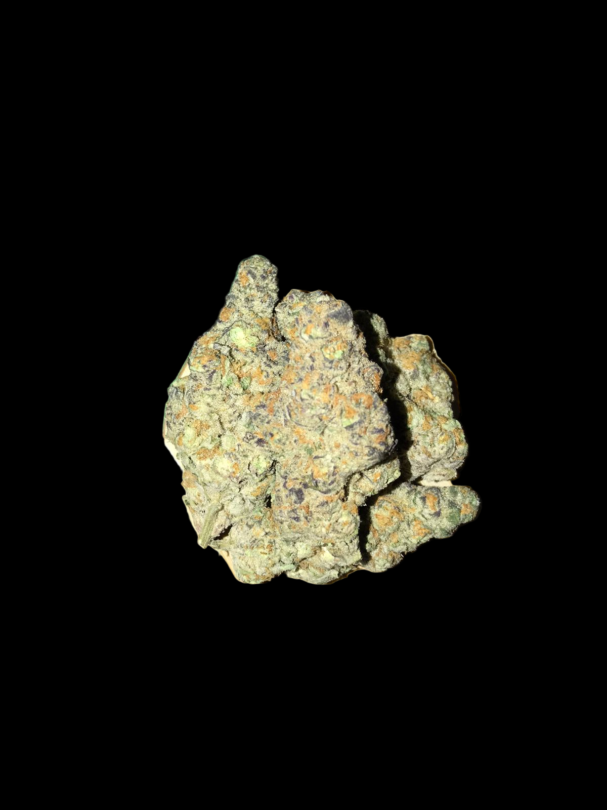 Cannabis buds in a wooden bowl with cannabis leaves in the background